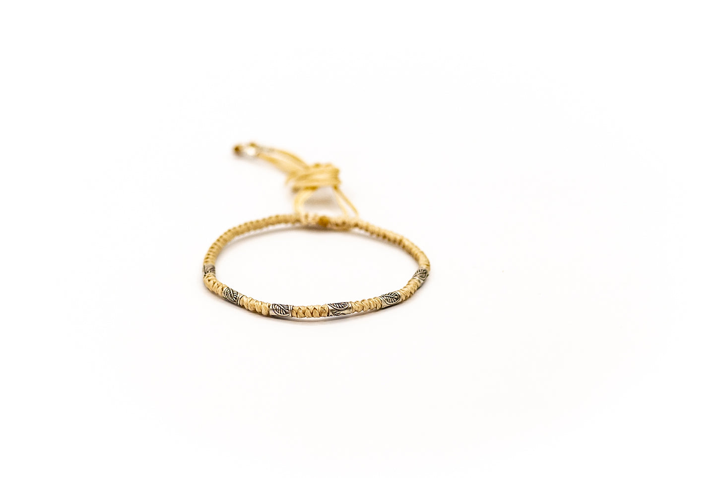 PSB679 - Silver Thin Bracelet on Light Beige Round Knot