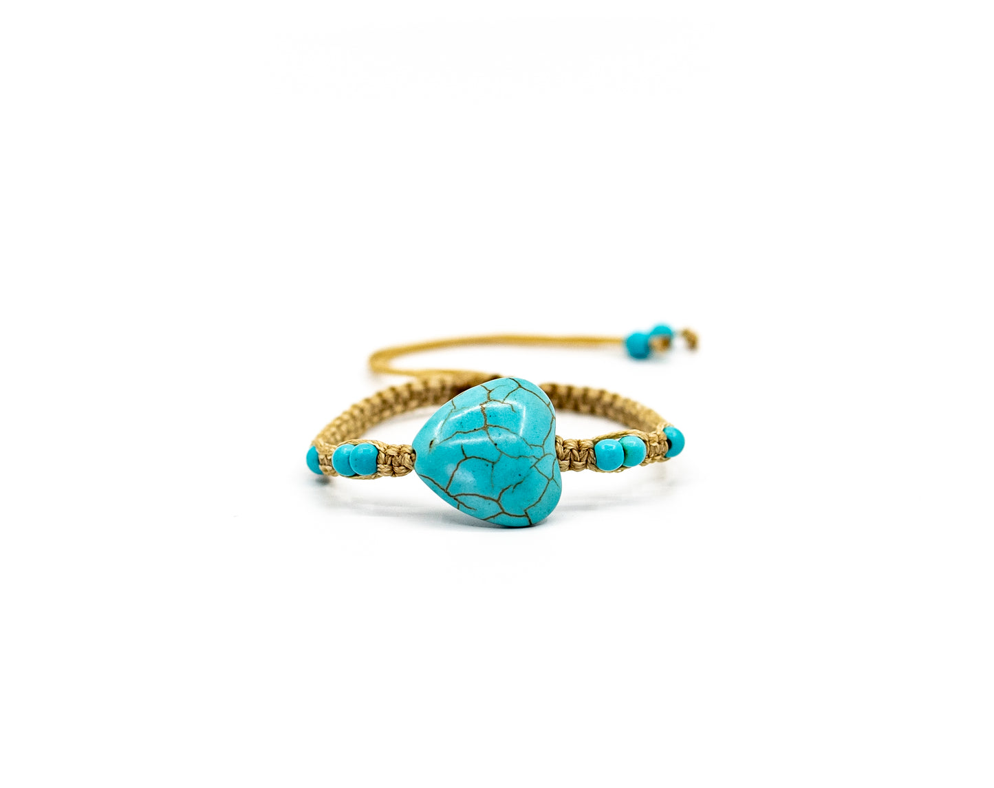 PALM STRINGS - TURQUOISE STONE HEART WITH SMALL TURQUOISE STONE BEADS ON SAND STRING