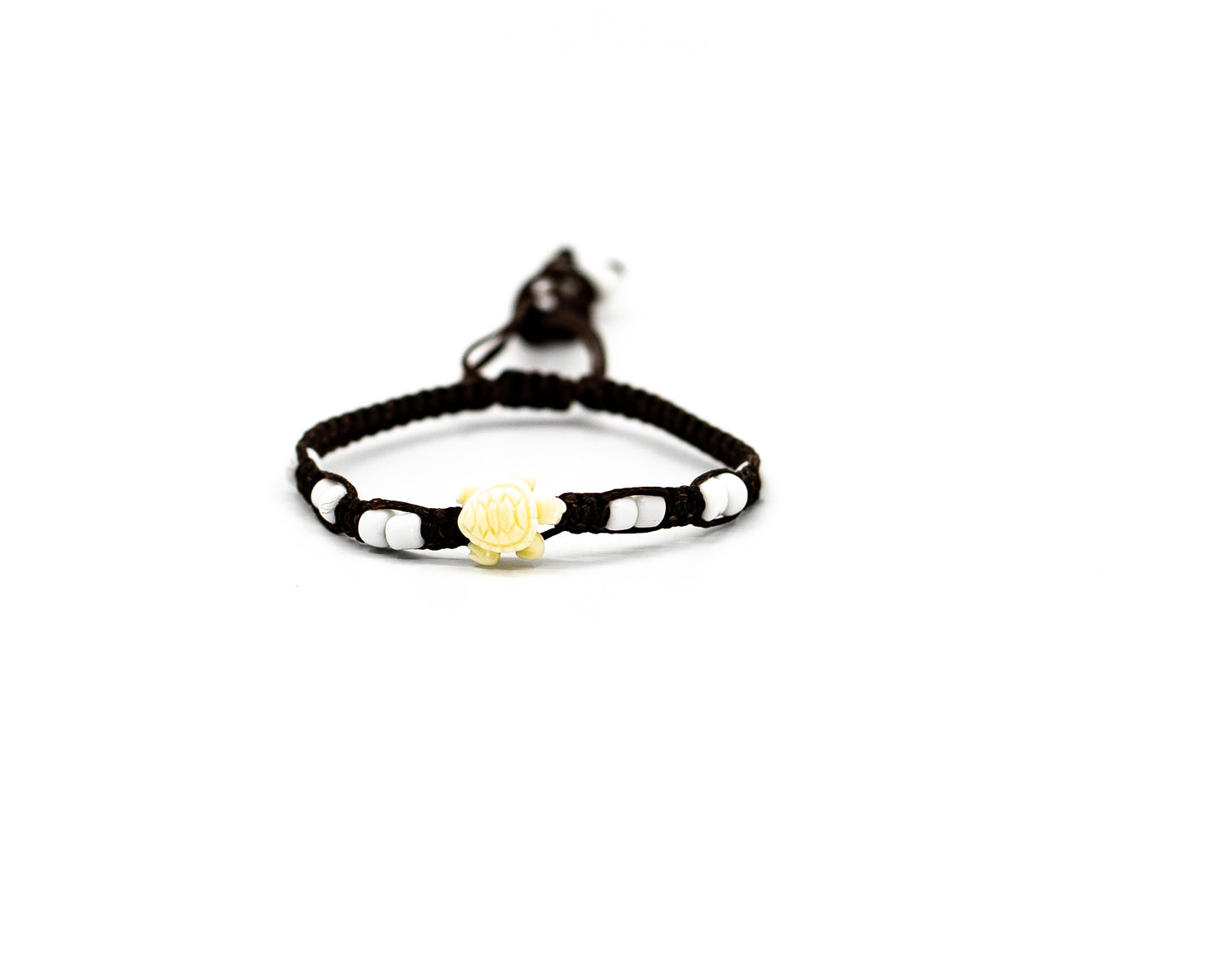 PALM STRINGS - SMALL IVORY TURTLE WITH WHITE BEADS FLAT KNOT BROWN STRING