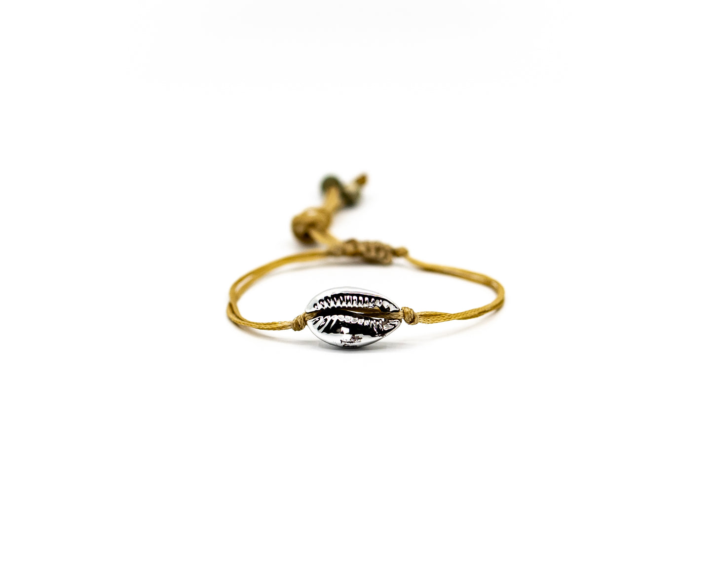 PALM STRINGS - SINGLE MEDIUM SILVER PLATED COWRIE ON CREAM STRING