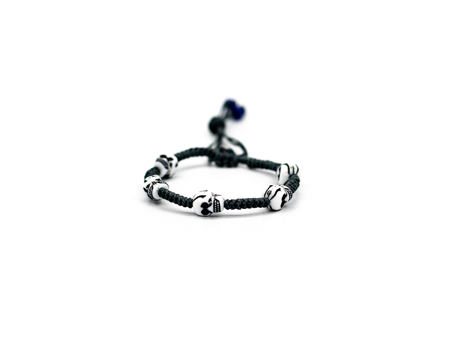 PSB545 - Skull Bracelet with Small Royal Blue Beads on Grey String