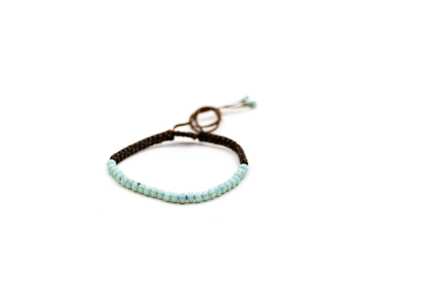 PALM STRINGS - SMALL LIGHT TURQUOISE BLUE CRYSTAL BEADS ON BROWN STRING