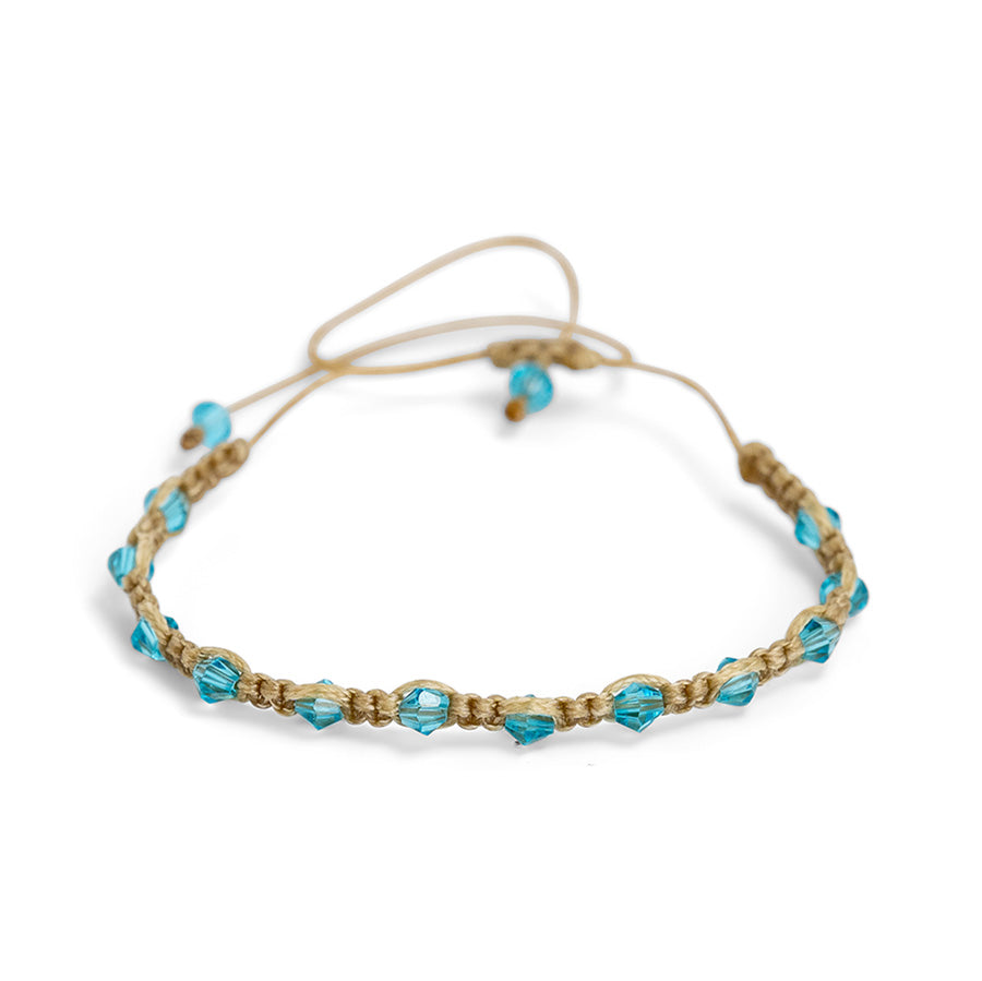 PALM STRINGS - LARGE OVAL BLUE CRYSTALS ON SAND STRING