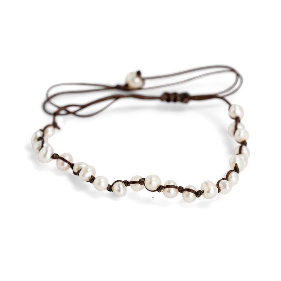 PALM STRINGS - WHITE POT PEARLS ON BROWN STRING