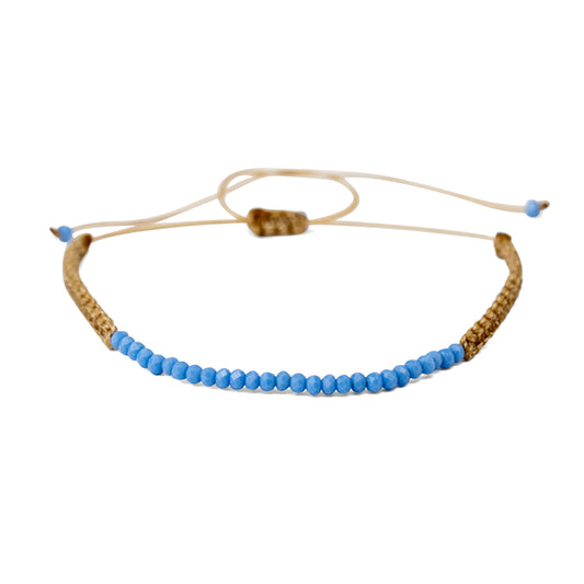 PSB1069 - Small Bright Deep Blue Crystal Bracelet on Sand String