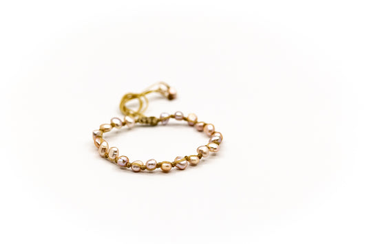 PSB445 - Full Single Pink Pearl Bracelet on Sand String