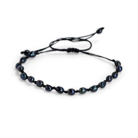 PALM STRINGS - 3-4MM BLACK WITH BLUE TINGE RICE PEARLS ON BLACK STRING